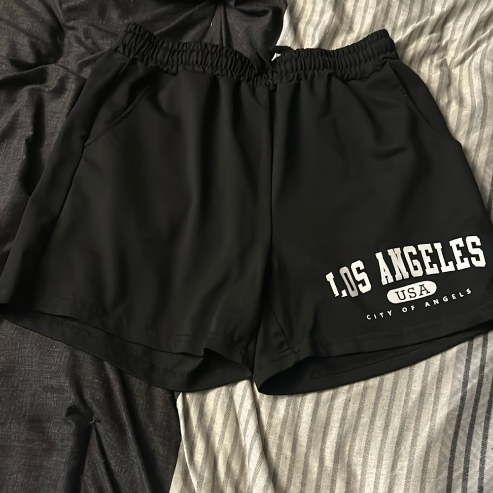 Size small black SHEIN shorts.